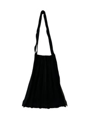 Abanica Tote in Black, featuring pleating detail, arm straps, and spacious interior. Perfect for city life and personalized styling.