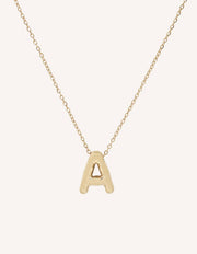 Bubble Initial Necklace with bold, rounded 3D letter pendant, perfect for layering or wearing solo.