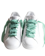 Close-up of green Vichy checkered laces highlighting the bold gingham pattern