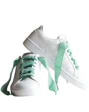 Close-up of green Vichy checkered laces highlighting the bold gingham pattern