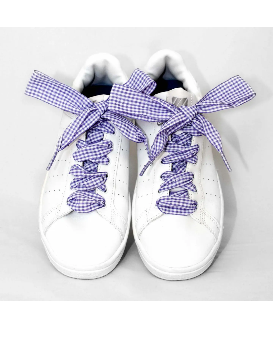 Close-up of purple Vichy checkered laces highlighting the bold gingham pattern