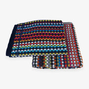 Colorful pure cotton terry towel, unique color combinations, perfect for the beach, crafted from leftover yarns for sustainability.