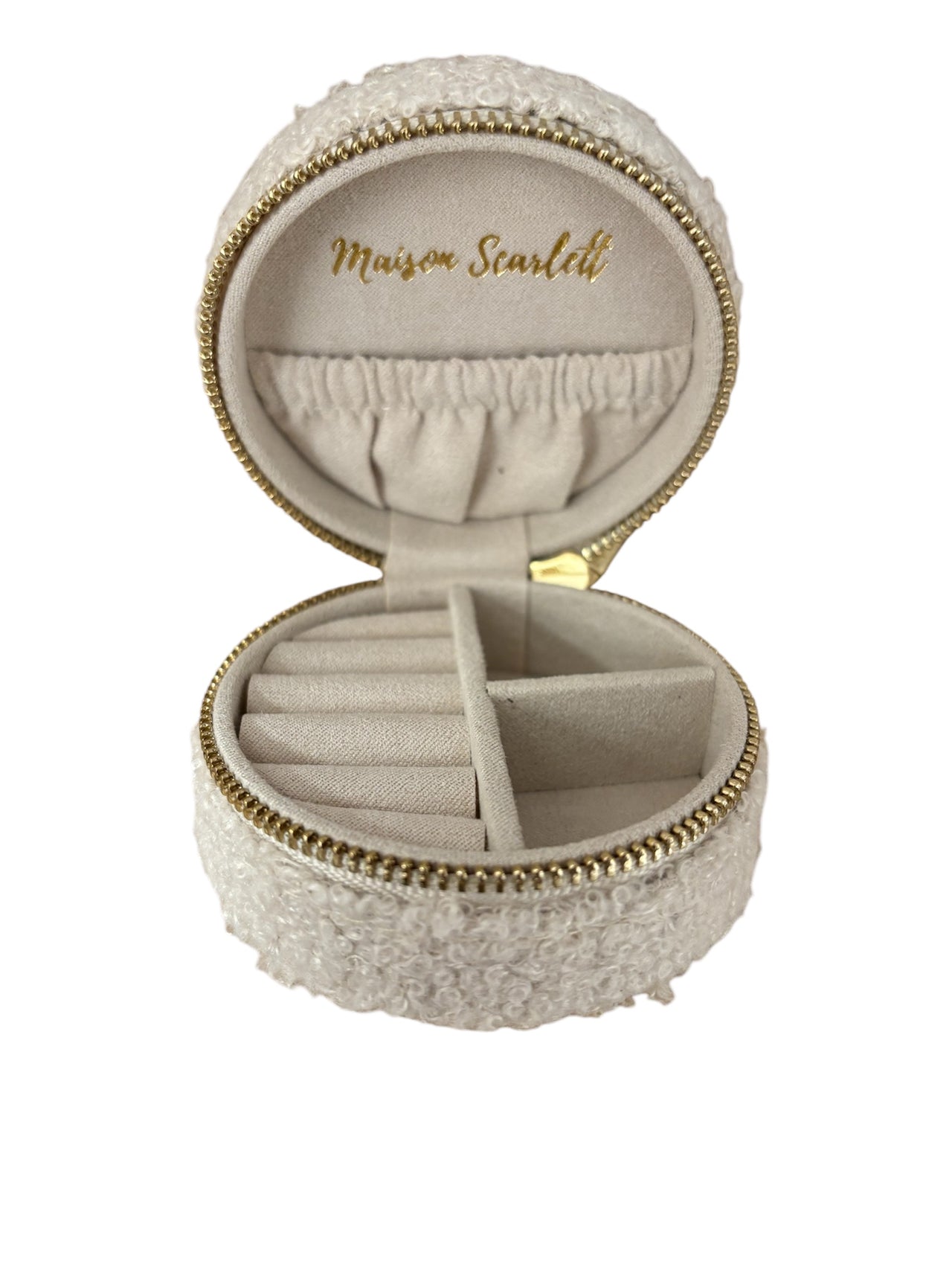 Compact teddy fabric jewelry case with soft velvet interior, ideal for storing rings, earrings, and necklaces for travel.