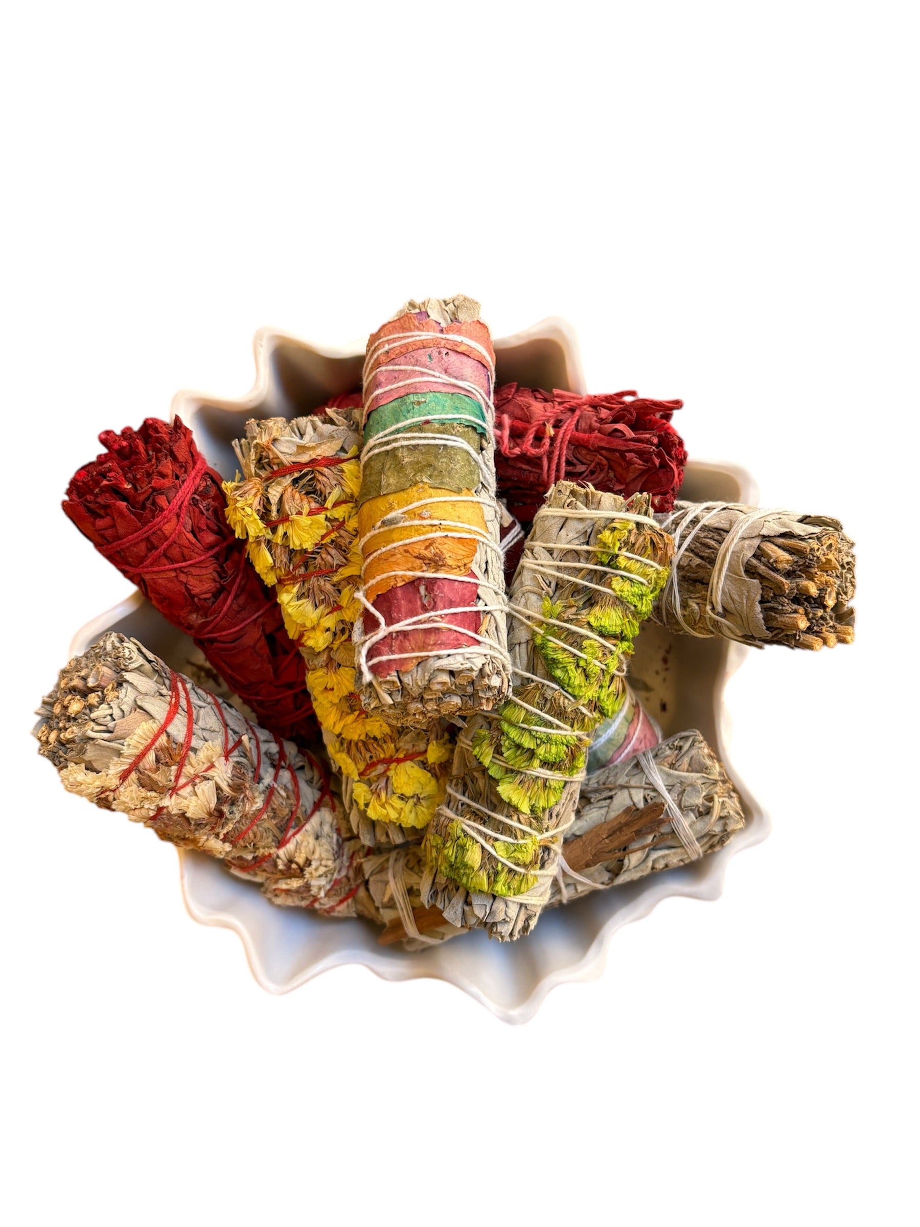 Handcrafted White Sage smudge stick with botanical blends for cleansing and positive energy.