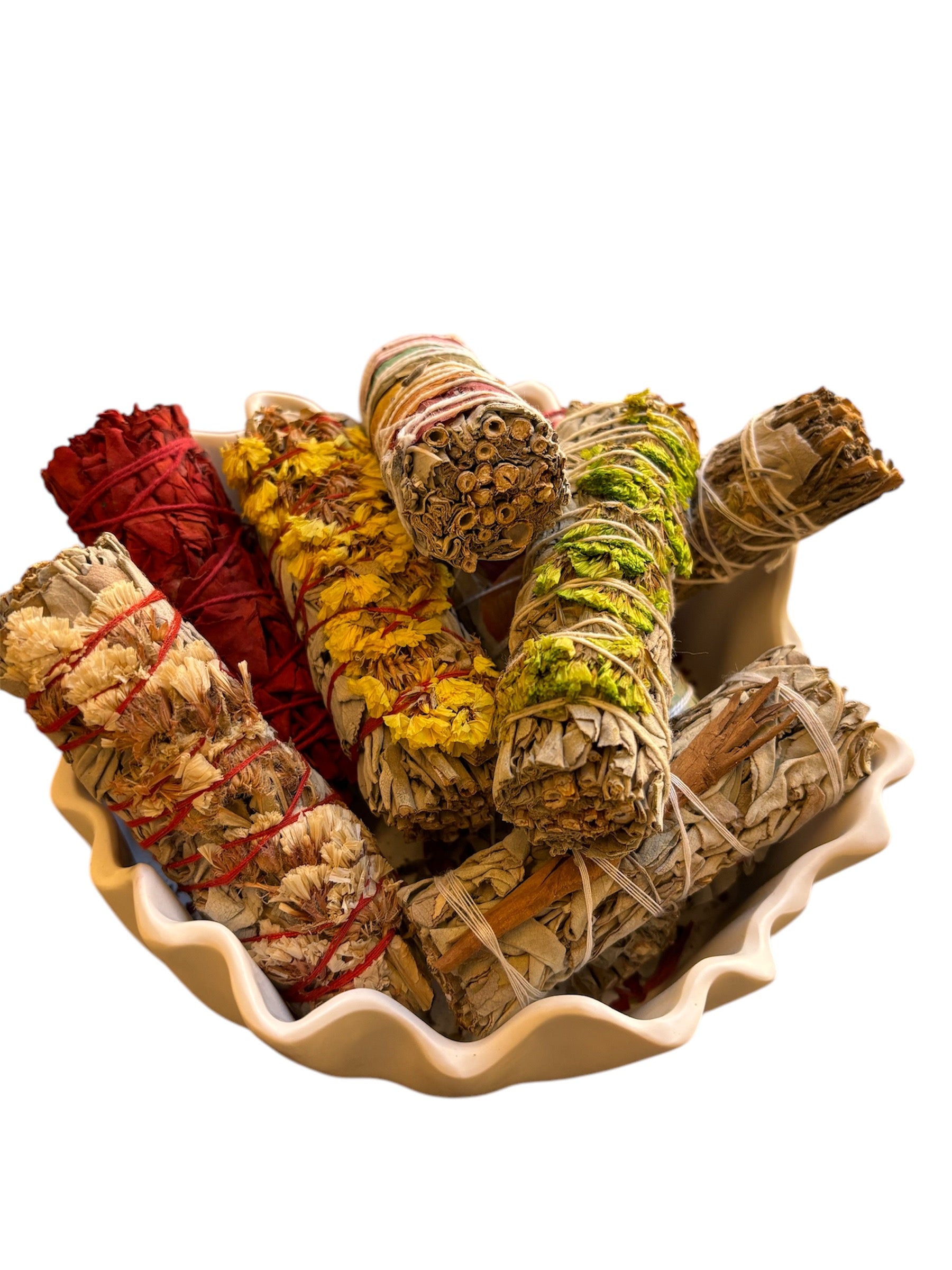 Handcrafted White Sage smudge stick with botanical blends for cleansing and positive energy.