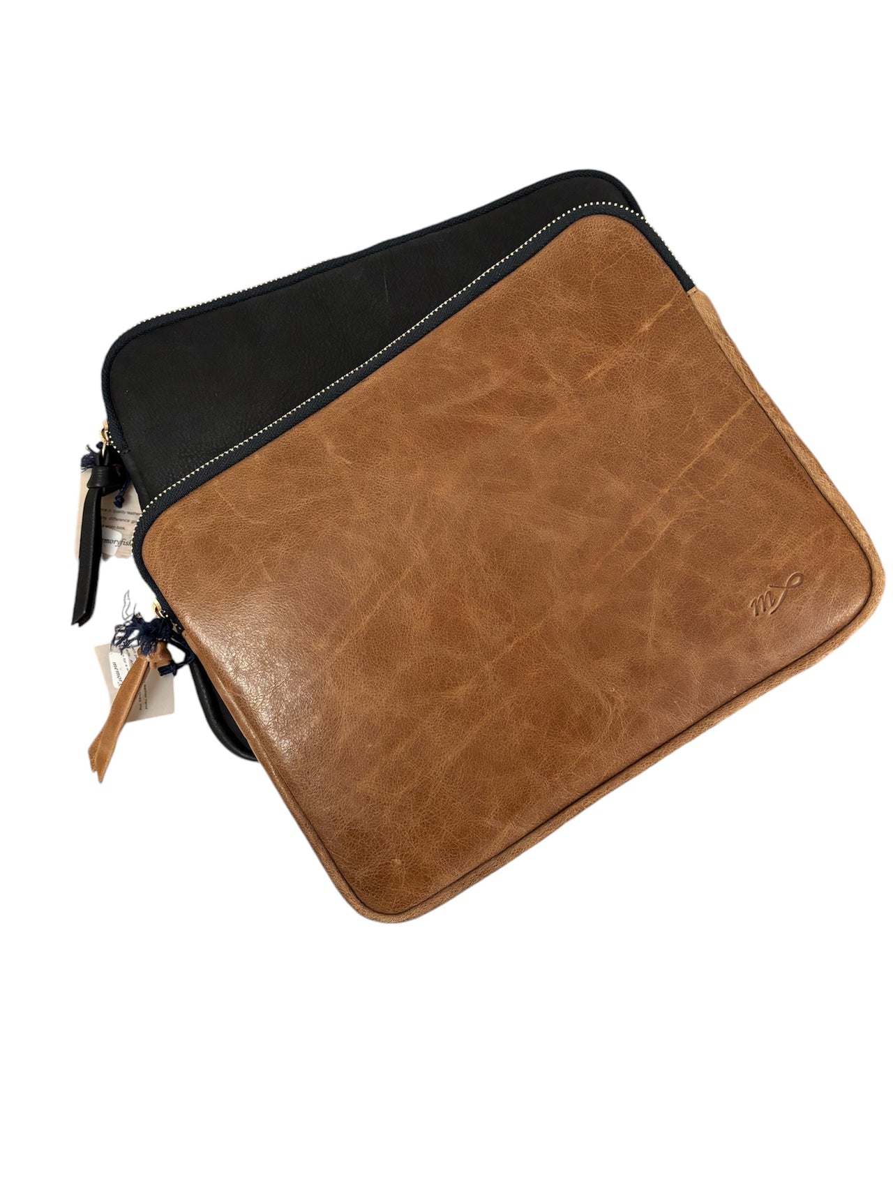 Handmade leather laptop pouch with patterned fabric lining, 26x22cm, designed for durability and style.