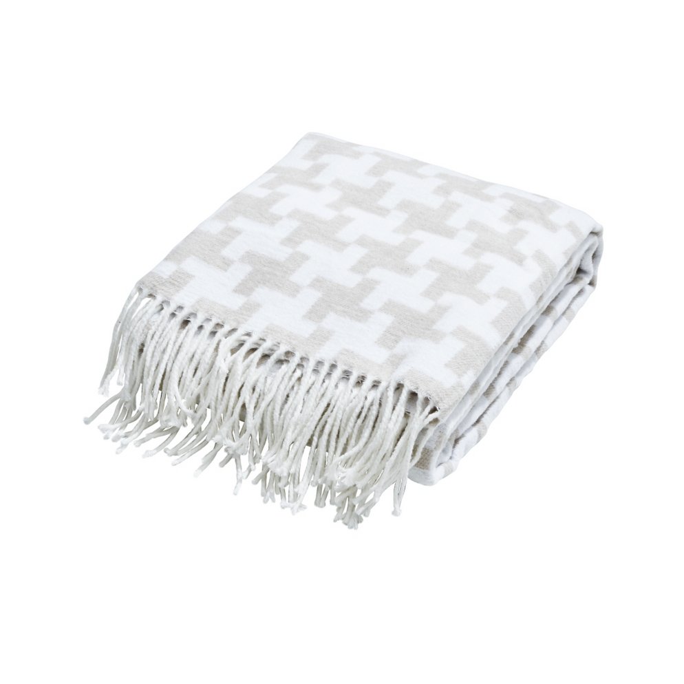 Houndstooth throw with fringed edges, made from a soft cotton and polyester blend, perfect for sofas and beds.