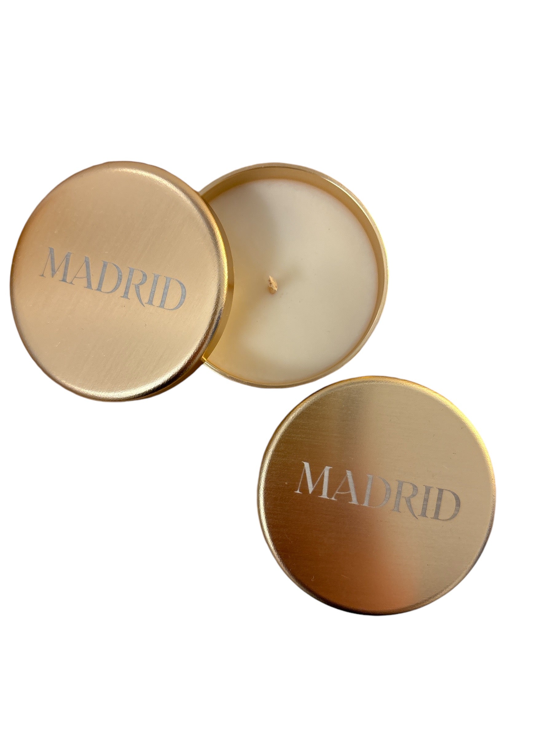 classic, chic style Madrid keepsake candle in gold tin with simple etching on lid