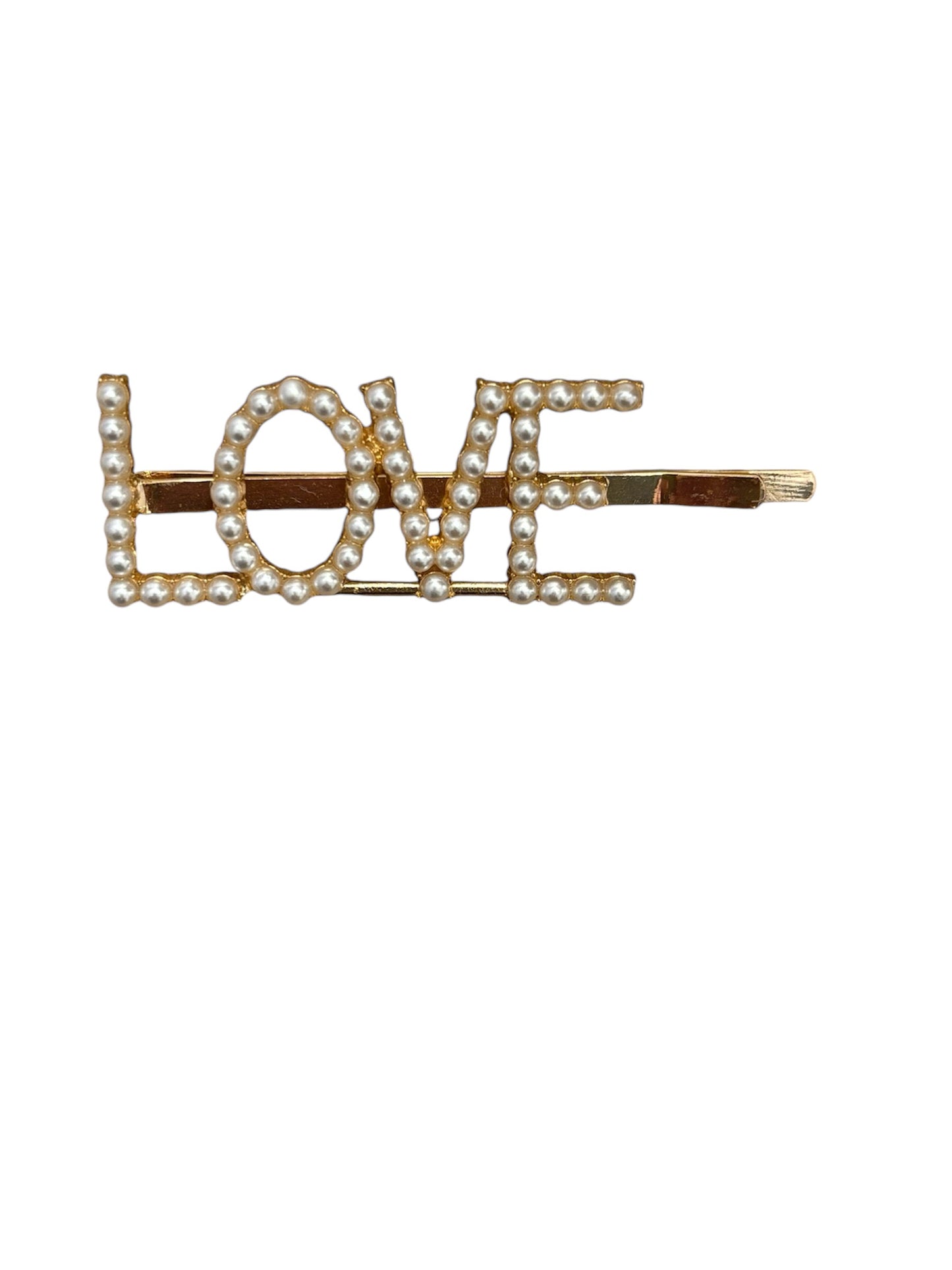 gold hair clip with LOVE in capital letters in pearls