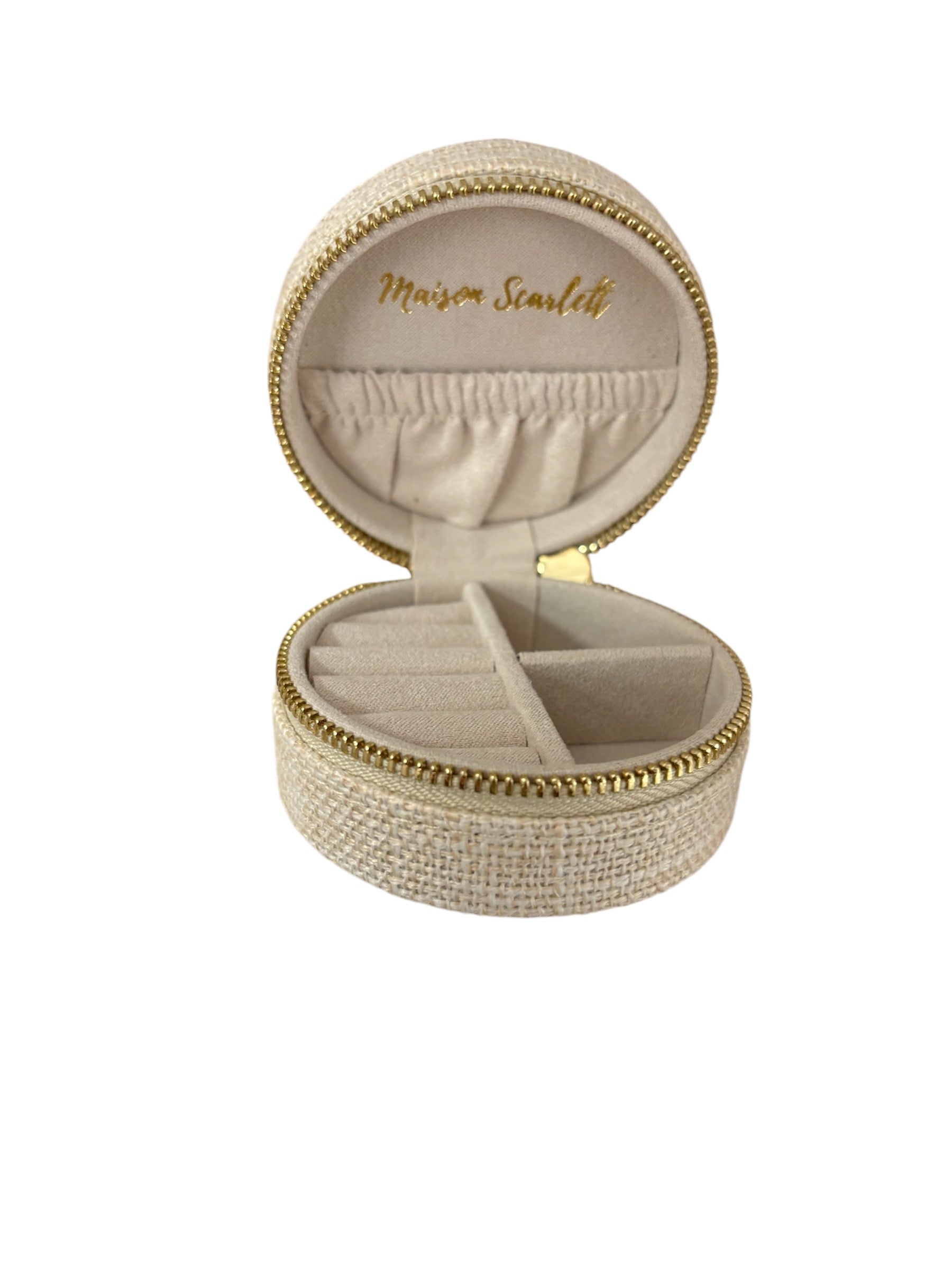 Mini linen jewelry case with gold zipper and velvet interior, designed for organizing rings, earrings, and necklaces.