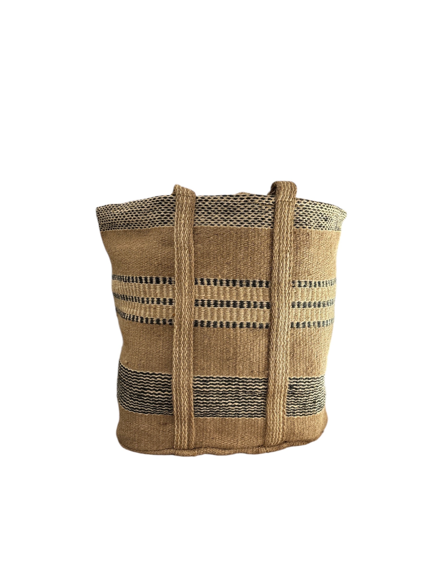 Natural jute basket with sturdy handles, ideal for home storage and organization. Spacious and stylish with an earthy, minimalist design.