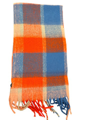 Plush plaid scarf in persimmon, sky blue, and soft pink with a fuzzy, ultra-soft texture.