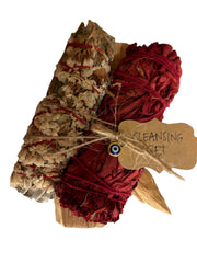 KITI cleansing set with White Sage, Dragon's Blood, Palo Santo, and Evil Eye charm for protection and balance.