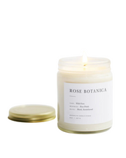 Rose + Sandalwood candle in a clear glass jar with minimalist label, by Brooklyn Candle Studio