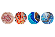 Set of 4 geode design dolomite coasters with natural patterns, ideal for protecting tables from scratches and heat.