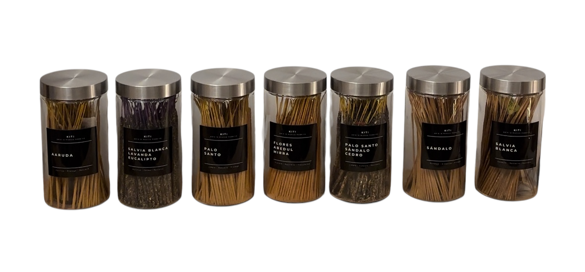 Seven glass jars filled with assorted incense sticks at KITI’s Los Siete Sagrados in Madrid