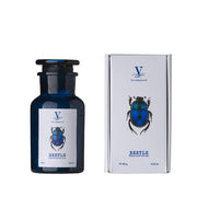 Vila Hermanos Beetle Candle, part of the Talisman Collection, made with natural soy and coconut wax. Infused with green, creamy, and spicy notes, symbolizing luck and inner strength.