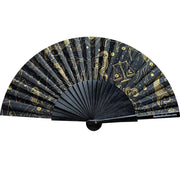 Zodiac Fan with gold print and black FSC-certified wood handles, fully opened to showcase its 46 cm width. Eco-friendly, stylish, and perfect for summer.