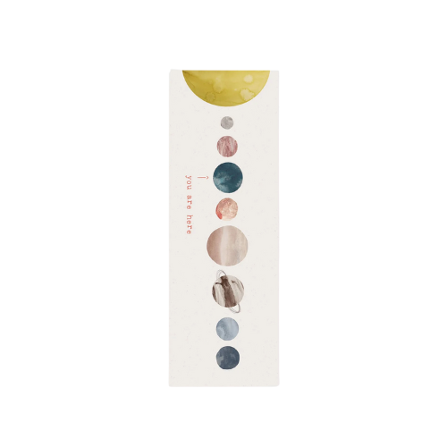 Sustainable bookmark with watercolor planets and "you are here" message, printed on recycled FSC-certified paper.