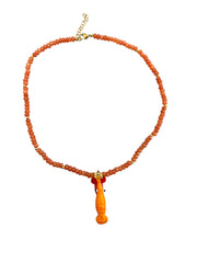Handmade necklace with colorful crystal beads and a whimsical glass sea creature charm. Adjustable up to 41cm with a clasp closure. Available in three designs.